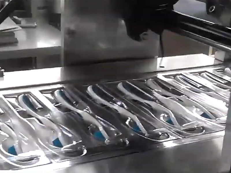 Toothbrush automatic blister packaging machine